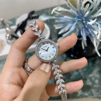 Новые круглые серебряные женские часы Lady Light, роскошные и нишевые, маленькие и изысканные наручные часы на цепочке с маленьким циферблатом, полностью украшенные драгоценными камнями.